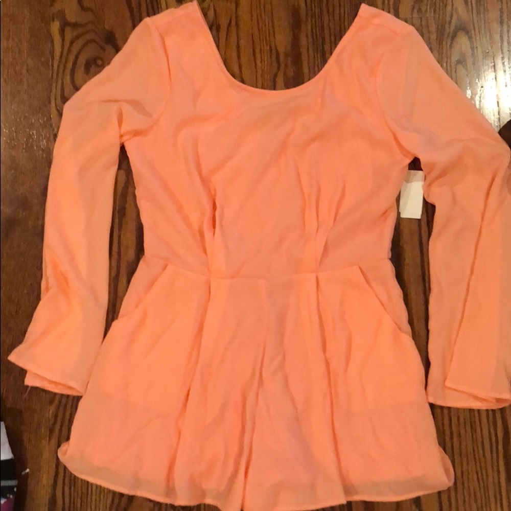 Peach romper size small
